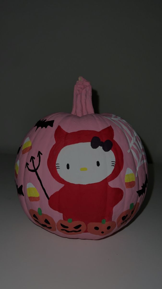 a hello kitty pumpkin sitting on top of a table