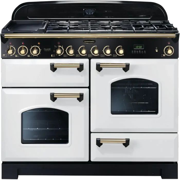 a white and black stove top oven with two burners on the front, and gold trimmings