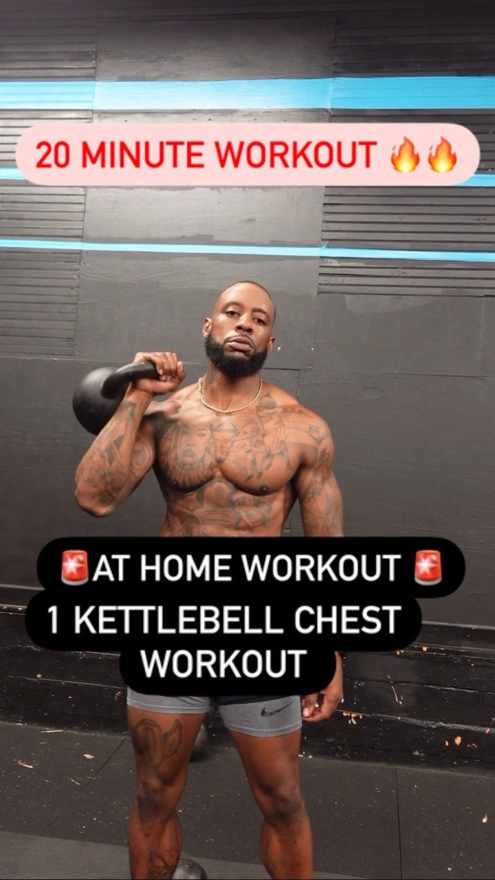 a man standing in front of a mirror with the words at home workout 1 kettlebell chest workout