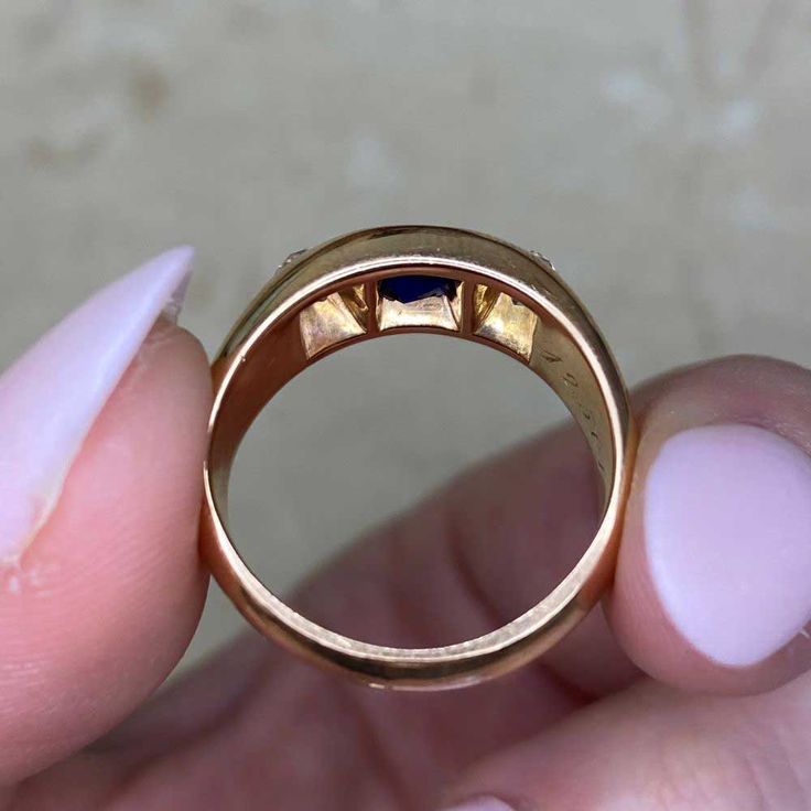 A vintage French three stone gypsy ring, featuring a round cut natural sapphire weighing approximately 0.57 carats. Two old mine cut diamonds weighing approximately 0.15 carats each flank the center stone. This ring was handcrafted in 18k yellow gold circa 1965, and bears French hallmarks.
The measurements of the sapphire are approximately 5.20mm x 5.30mm x 3.07mm. The band width ranges from 5.70mm – 9.19mm.
This ring is currently size 6, and can be resized at no extra cost.
If you have any ques Classic Sapphire Ring With Rose Cut Diamonds For Promise, Luxury Three Stone Sapphire Ring, Timeless Round Three Stone Sapphire Ring, Timeless Three Stone Round Cut Sapphire Ring, Vintage Sapphire Three Stone Diamond Ring, Vintage Sapphire Three-stone Ring, Vintage Sapphire Three Stone Ring, Three-stone Diamond Sapphire Ring, Yellow Gold Three-stone Sapphire Ring