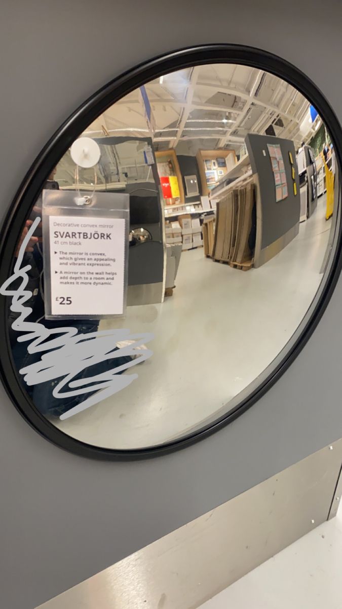 there is a mirror with writing on it