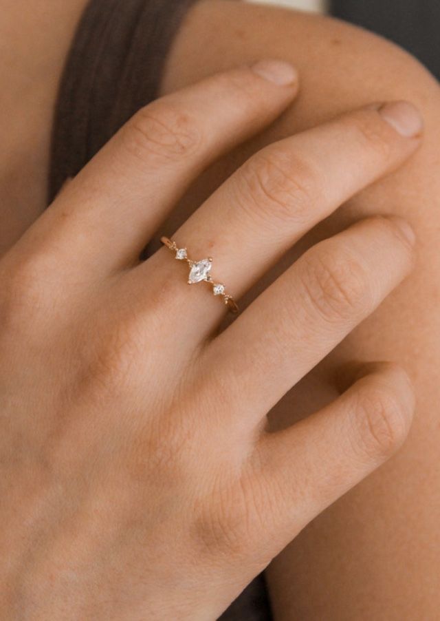 Minimalist Marquise Cut Vvs Diamond Ring, Minimalist Marquise Cut Diamond Ring With Vvs Clarity, Vvs Clarity Marquise Cut Minimalist Diamond Ring, Minimalist Vvs Clarity Marquise Cut Diamond Ring, Delicate Diamond Marquise Cut Ring, Minimalist Marquise Cut Single Diamond Ring, Delicate Marquise Cut Ring With Diamond Accents, Dainty Marquise Diamond Promise Ring, Delicate Marquise Cut Diamond Ring For Anniversary