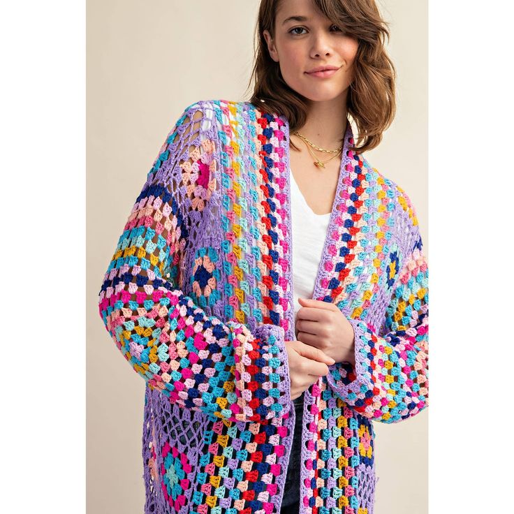 Add a pop of color to your wardrobe with this one-of-a-kind crochet duster! Crafted by hand with care, it exudes bohemian charm and features an open front design with playful, long fringes on the bottom hem. Model 5' 8" and wearing a Small Multicolor Open Knit Spring Cardigan, Spring Multicolor Open Knit Cardigan, Spring Bohemian Knit Outerwear, Multicolor Open Knit Outerwear For Spring, Bohemian Open Knit Beach Outerwear, Bohemian Multicolor Cardigan For Vacation, Bohemian Fall Cardigan With Crochet Trim, Bohemian Cardigan With Crochet Trim For Fall, Colorful Bohemian Outerwear For Spring