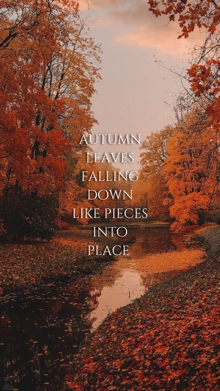 the words autumn leaves falling down like pieces into place are in front of a river