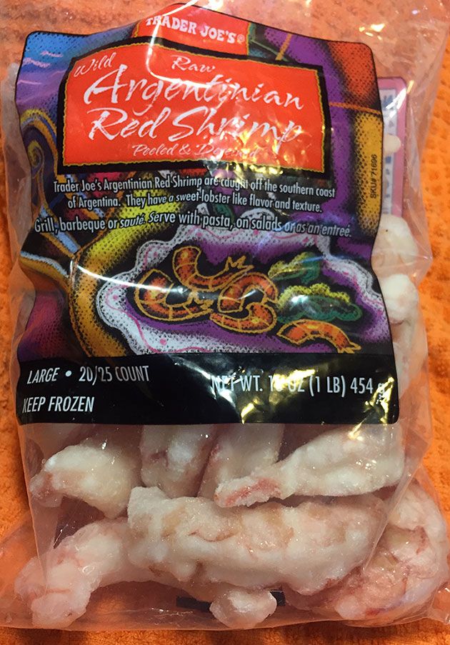 an image of frozen food in the bag on the table for sale at store or restaurant