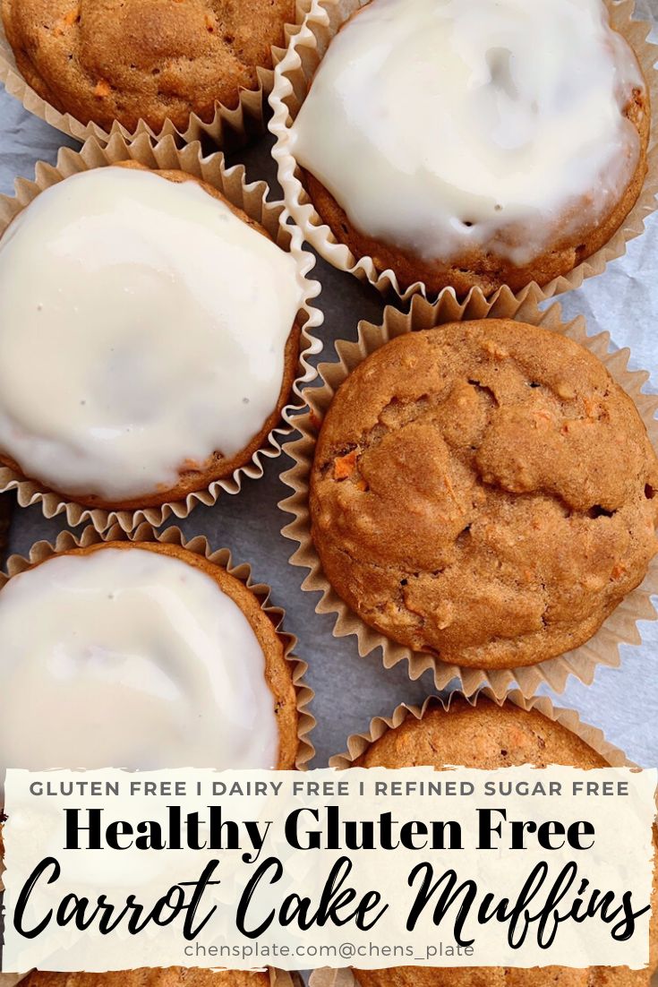 healthy gluten free carrot cake muffins with white frosting on top