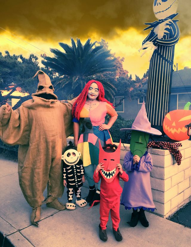 a group of people dressed up in halloween costumes