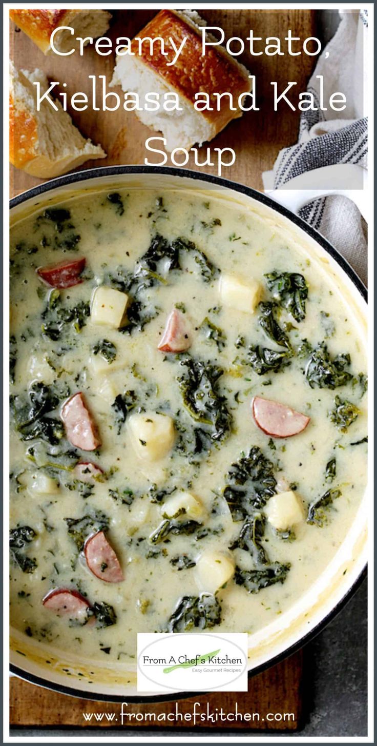 creamy potato, kielbasa and kale soup in a pot with bread on the side