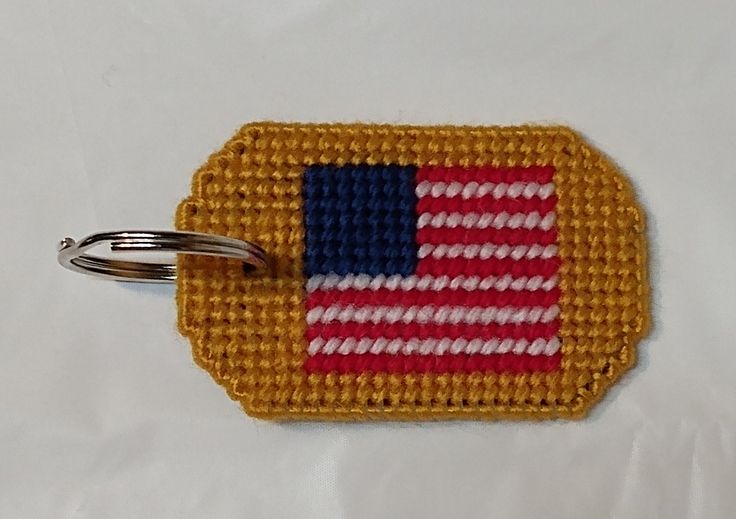 a woven keychain with an american flag on it