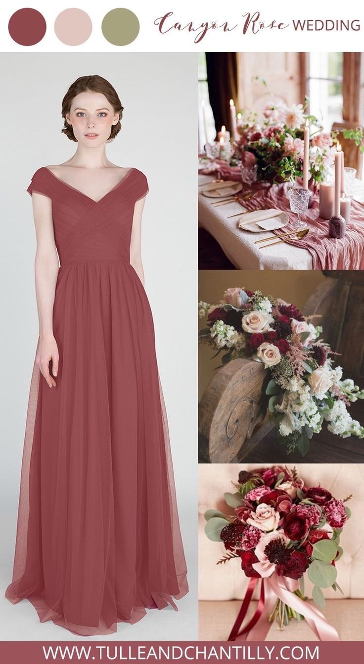 a woman in a long dress standing next to a table with flowers and candles