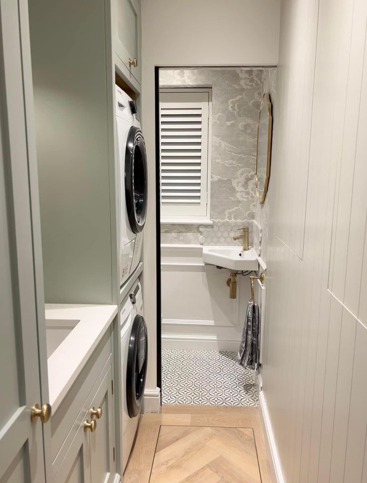 a washer and dryer in a small room