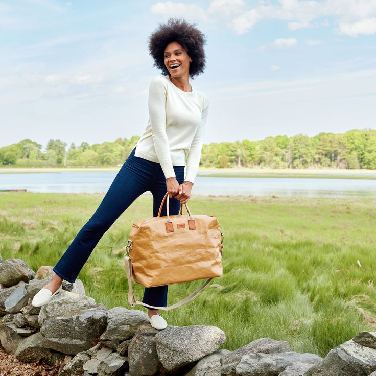 The essential weekender that will have every hotel guest admiring your bag. A unique, luxurious looking weekend tote with ample interior space capable of carrying you through a short getaway. Lightweight with versatile carrying options this bag is also water resistant and sustainably made from our TEC paper. Beige Rectangular Weekender Bag For On-the-go, Chic Tote Bag For Weekend Trips, Chic Brown Duffle Bag For Travel, Chic Weekender Bag With Leather Handles For Travel, Chic Rectangular Travel Bag For Weekend Trips, Beige Tote Weekender Bag For Travel, Chic Tote Travel Bag For Weekend Trips, Chic Rectangular Bag For Weekend Trips, Chic Rectangular Bags For Weekend Trips