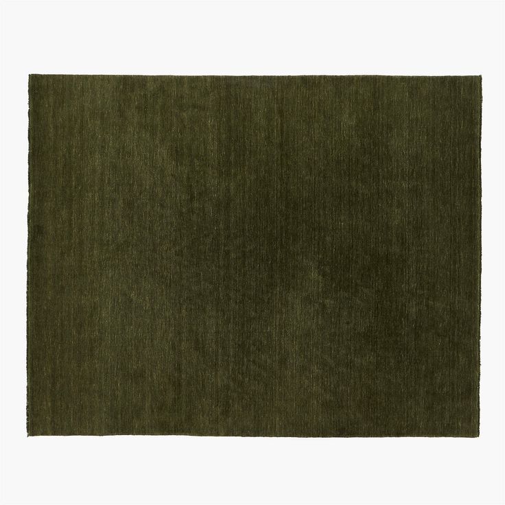 an area rug with green color on the top and bottom corner, in front of a white background