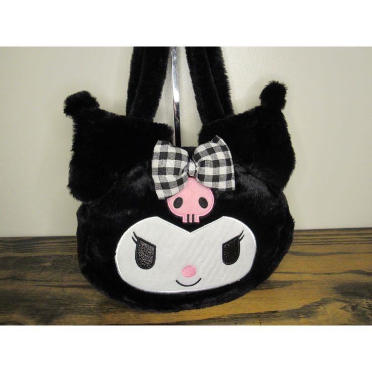 This Kuromi Shoulder Bag Is So Cute! It's Very Fuzzy, With Black Shiny "Fur," A Plaid Bow, A Pink Skull, And Sparkly Eyes. The Embroidery Is Quality And Really Stands Out. The Bag Has Double Handles, A Zipper Closure, And Adorable Floppy Ears. It Would Make A Great Novelty Item For Anyone Who Loves Kuromi, Or A Perfect Gift Idea For Fans Of The My Melody Series. Welcome To Sugarskulls&Unicorns! Please Feel Free To Ask Any Questions Offers Are Always Welcome Bundling Is The Very Best Way To Save Cute Black Shoulder Bag As Gift, Cute Black Shoulder Bag For Gift, Cute Black Bag For Gift, Cute Black Bags For Gifts, Black Kawaii Shoulder Bag As Gift, Cute Animal Design Shoulder Bag For School, Cute Hello Kitty Shoulder Bag As Gift, Cute Hello Kitty Shoulder Bag For School, Black Cat Design Shoulder Bag For School