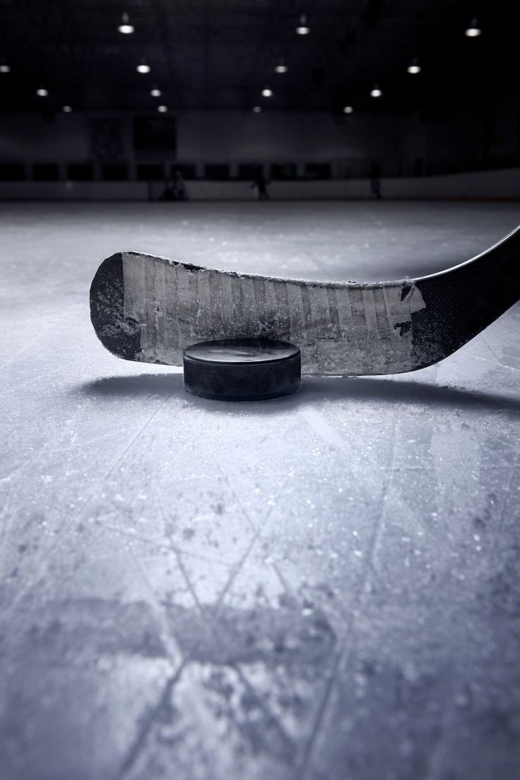 a skateboard on the ice in an indoor rink