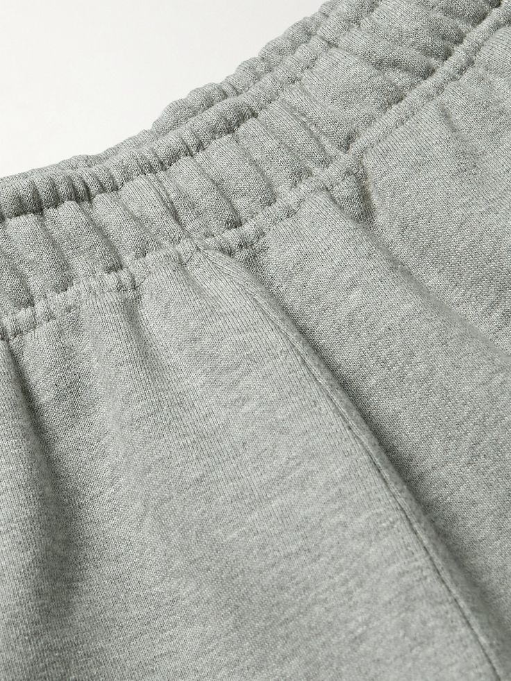 Nike's sweatpants are designed for everyday comfort and versatility. Updated with zipped pockets, they're cut for a neat taper from fleece-back cotton-blend jersey and have an elasticated drawstring waistband. Note the solo 'Swoosh' embroidered at the leg. Nike Collection, Sweatpants Nike, Sweatpants For Men, Nike Sweatpants, Nike Outfits, Drawstring Waistband, Mr Porter, Mens Sweatpants, Casual Pants