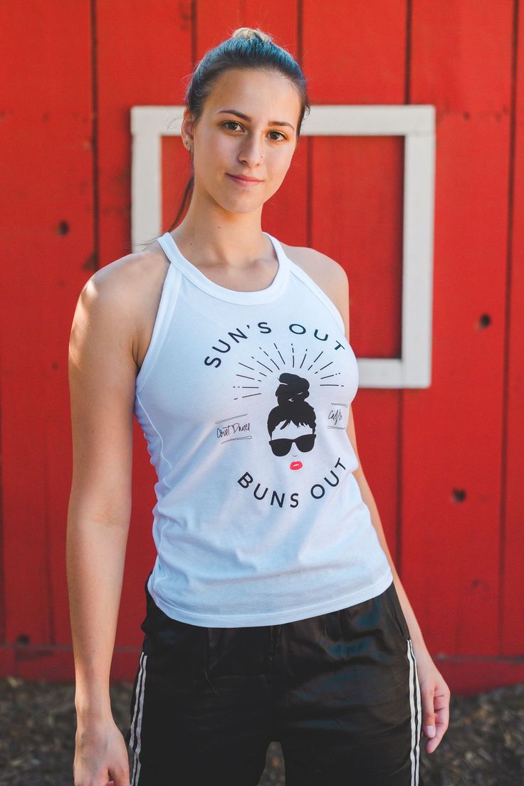 It's time to loosen up that Ballet Bun and let your hair down.This soft halter tank is great to wear as a coverup at the beach or over your leotard when you're running to grab a frappuccino between classes. Great tank from Covet Dance for when bunheads are off to their Summer Intensives or going on vacation. #sunsout #ballettank #dancertank #danceshirts #bunheads #dancewear #danceapparel #covetdance #covetdancer White Summer Racerback Tank Top, White Racerback Tank Top For Summer, Casual Summer Gym Tank Top, Fun Tank Top For Beach In Spring, Summer Beach Tank Top With Built-in Bra, Fun Tank Top For Summer Vacation, Fun Summer Vacation Tank Top, White Athleisure Tank Top For Summer, Casual Tops With Built-in Bra For Beach Season