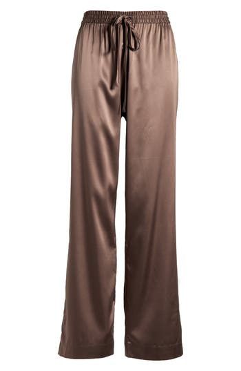 Elevate your evening routine in these ultrasoft satin pajama pants topped by a comfy elastic waist. 30" inseam; 20" leg opening; 12" front rise; 15 1/2" back rise (size Medium) Elastic/drawstring waist 62% polyester, 33% recycled polyester, 5% spandex Machine wash, tumble dry Imported Satin Pajama Pants, Satin Pajama, Evening Routine, Satin Pajamas, Nordstrom Store, Fabric Gifts, Free Fabric, Drawstring Waist, Pajama Pants