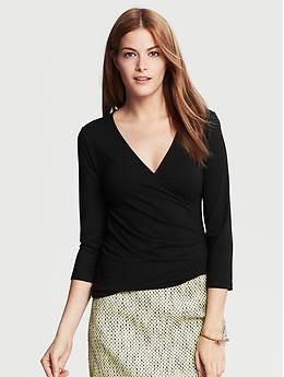 Black Faux-Wrap Top | Banana Republic Fitted V-neck Wrap Top For Work, Fitted Wrap Top With Faux Wrap And Surplice Neckline, Fitted Wrap Top With Surplice Neckline, Fitted Faux Wrap Top With Surplice Neckline, Chic Surplice Neckline Wrap Top For Night Out, Chic Faux Wrap Top For Night Out, Chic Faux Wrap Top For Fall, Chic Stretch Wrap Top With Surplice Neckline, Fitted Wrap Top With Surplice Neckline For Fall