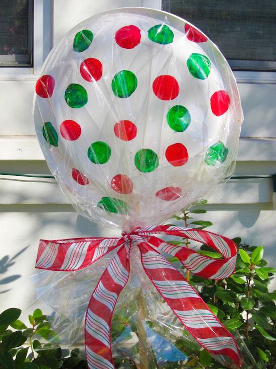 a large balloon sitting on top of a potted plant