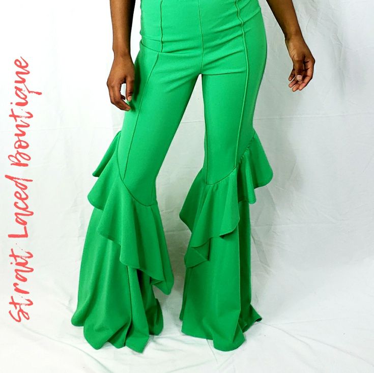 Unlock The Goddess In You In These Cute Green High Waisted Pants. These Pants Feature Stretch Fabric, Elasticized Waist, And Ruffle Flared Legs. Pair This With Your Favorite Top And Heels And Be The Fashion Diva That You Are! 95% Polyester 5% Spandex Green High-waist Ruffled Bottoms, High-waist Green Ruffled Bottoms, Trendy Ruffled Stretch Pants, Trendy Ruffled Pants, Trendy Stretch Pants With Ruffles, Fitted Full-length Ruffled Bottoms, Green Full-length Bottoms For Night Out, Trendy Wide Leg Ruffled Pants, Fitted Ruffle Flare Pants