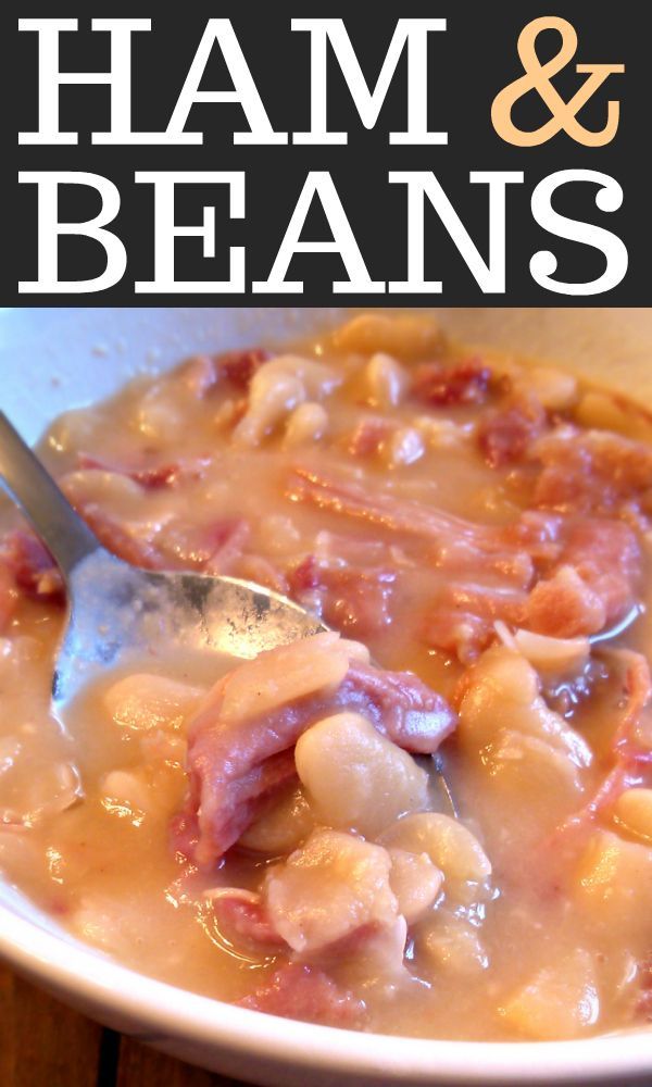 ham and bean soup in a white bowl with a spoon on the side that has text overlay