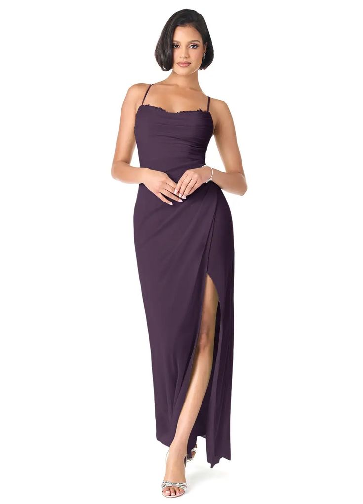 a woman in a long purple dress