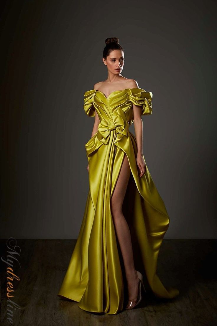 Looking for a head-turning dress that will make you feel like a million bucks? Look no further than the Ziad Germanos ZG86. This gorgeous satin dress features a beautiful draping that is sure to flatter your figure. Plus, the luxurious fabric will make you feel like royalty. Whether you're attending a black tie event or getting dressed up for a hot date, this is the perfect dress for making a statement. Head Turning Dress, Peplum Gown, Drape Gowns, A Line Evening Dress, Unique Prom Dresses, Simply Chic, Chiffon Gown, A Line Gown, Gorgeous Gowns