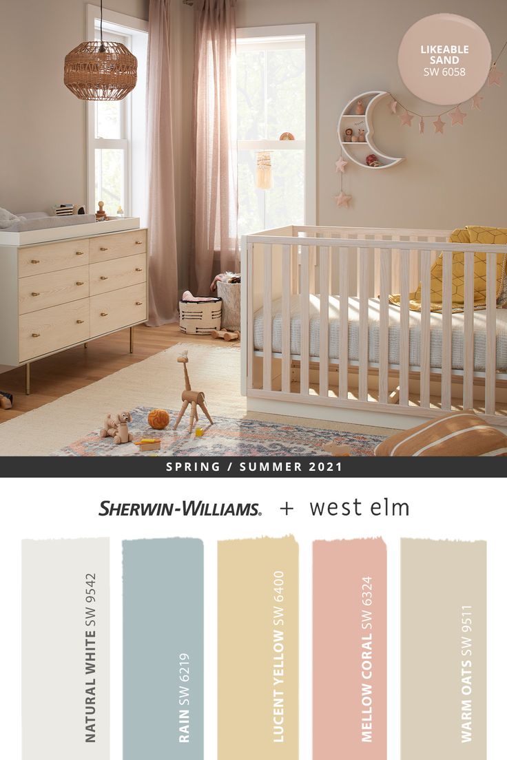 a baby's room with neutrals and pastel colors, including the crib