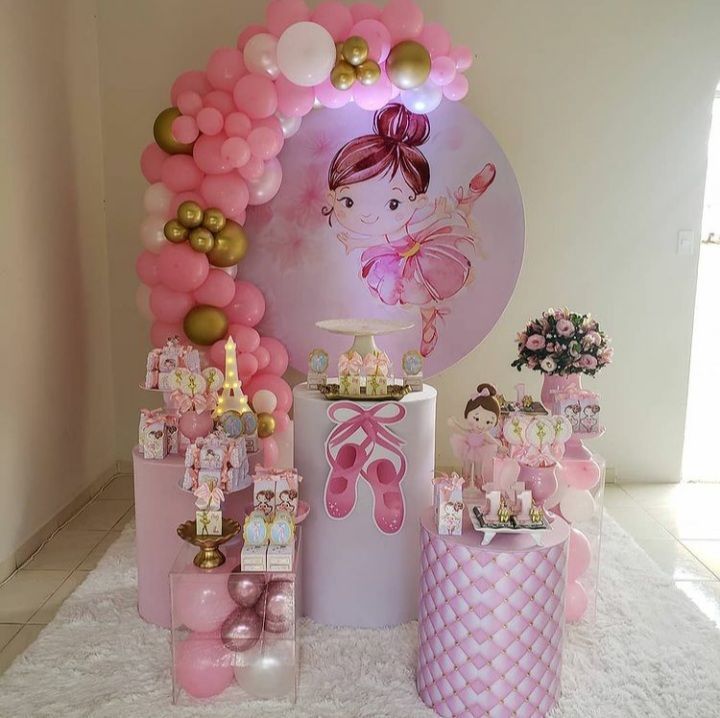 a ballerina themed birthday party with balloons and decorations