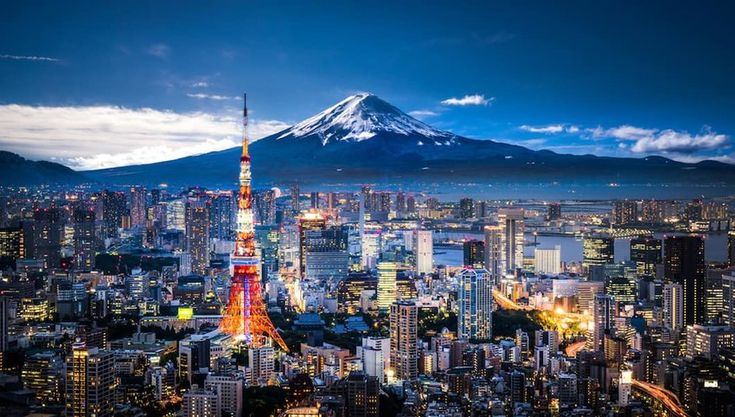 a cityscape with a mountain in the background and a red frame around it