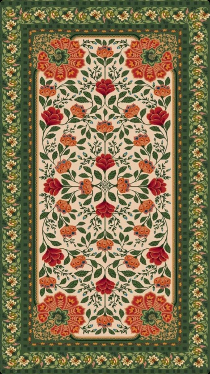 a green and red rug with flowers on it