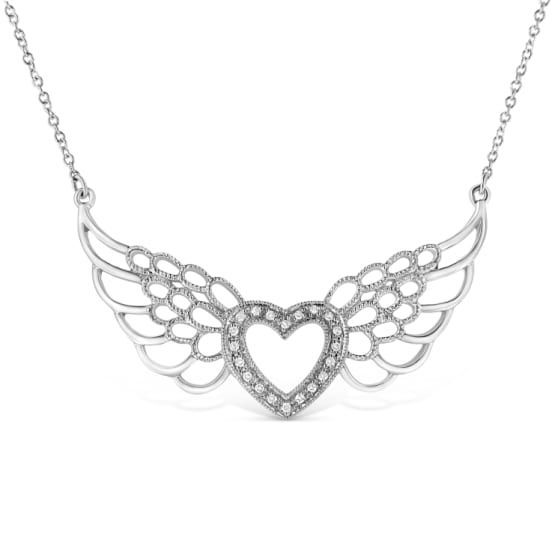 Gift this romantic and stylish diamond angel wings to your special angel. Styled on sterling silver this pendant features a glistening heart flies on brightly polished widespread angel's wings embellished with 20 pave set round cut diamonds. This whimsical pendant hangs from a beautiful cable chain. Total diamond weight is 1/20 ctw. Diamond Angel, Beads Craft Jewelry, Wing Jewelry, Arrow Tattoo, Heart With Wings, Fairy Wings, Pendant Design, Heart Pendant Necklace, Round Cut Diamond