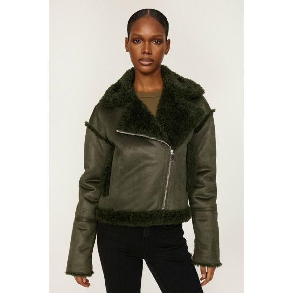 Green faux shearling (100% Polyester). Jacket. Long sleeves. Collar. Front zipper closure. 19" from shoulder to hemline. Imported. Shearling Biker Jacket With Zipper Closure, Shearling Biker Jacket With Long Sleeves, Shearling Long Sleeve Outerwear For Fall, Long Sleeve Shearling Outerwear For Fall, Shearling Biker Jacket With Faux Fur Lining, Shearling Outerwear With Zipper And Long Sleeves, Shearling Outerwear With Zipper Closure And Long Sleeves, Faux Fur Outerwear With Zipper Closure, Faux Fur Outerwear With Zipper