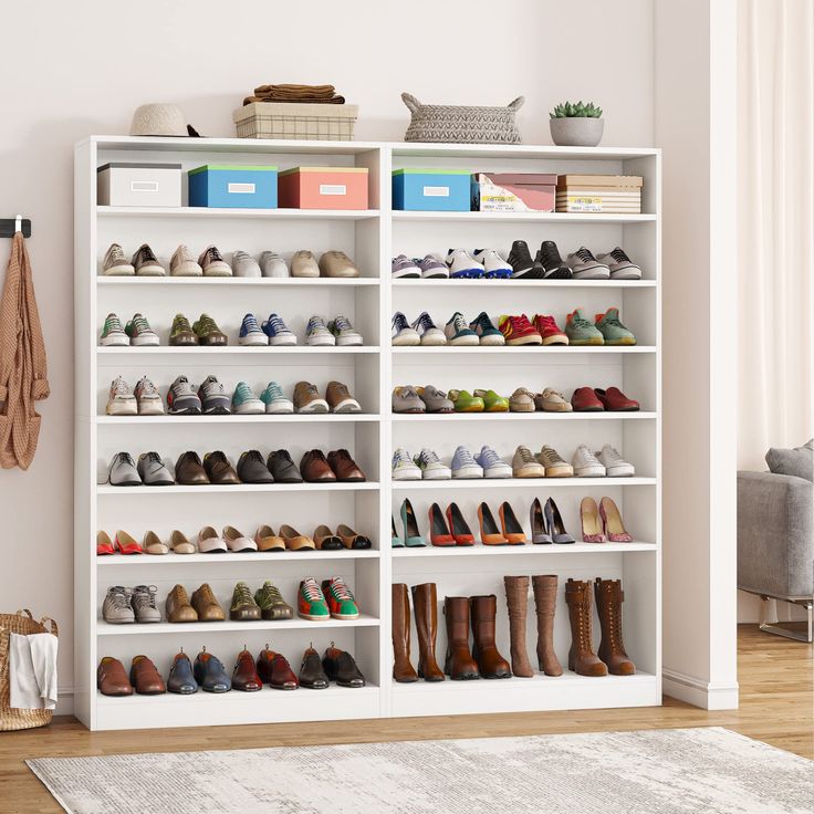 a white shoe rack filled with lots of shoes