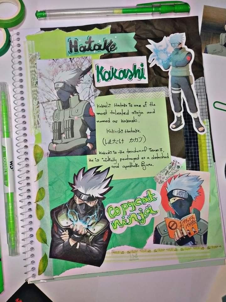 an open notebook with various stickers and pens on it, along with other items