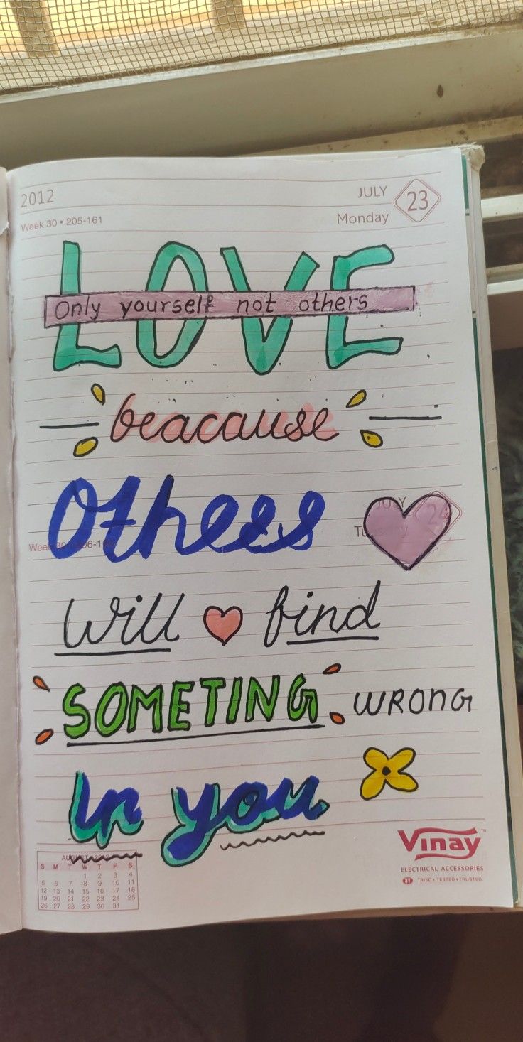 an open notebook with writing on it that says love because others will find something wrong in you