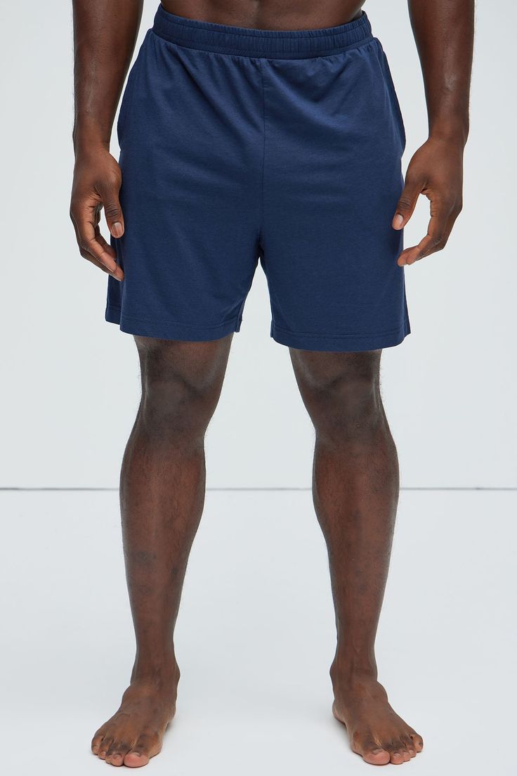 Available In Navy, Black, Brown, Grey and Khaki Elastic Waist Side Pockets Pair With "Essential Lounge Tank" Pair With "Essential Lounge Tee" Pair With "Essential Lounge Sleeveless Muscle Tee" Pair With "Essential Lounge Long Sleeve Tee" 48% Cotton, 47% Modal, 5% Spandex Final Sale. Imported | Mens Essential Modal Lounge Shorts in Navy Blue size Small by Fashion Nova Navy Shorts For Loungewear, Navy Athleisure Shorts For Loungewear, Basic Solid Color Athletic Shorts For Loungewear, Basic Athletic Shorts For Loungewear, Navy Loungewear Shorts, Basic Loungewear Athletic Shorts, Navy Cotton Moisture-wicking Bottoms, Basic Blue Cotton Activewear, Navy Cotton Athletic Shorts