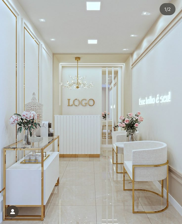 the interior of a nail salon with white and gold furniture