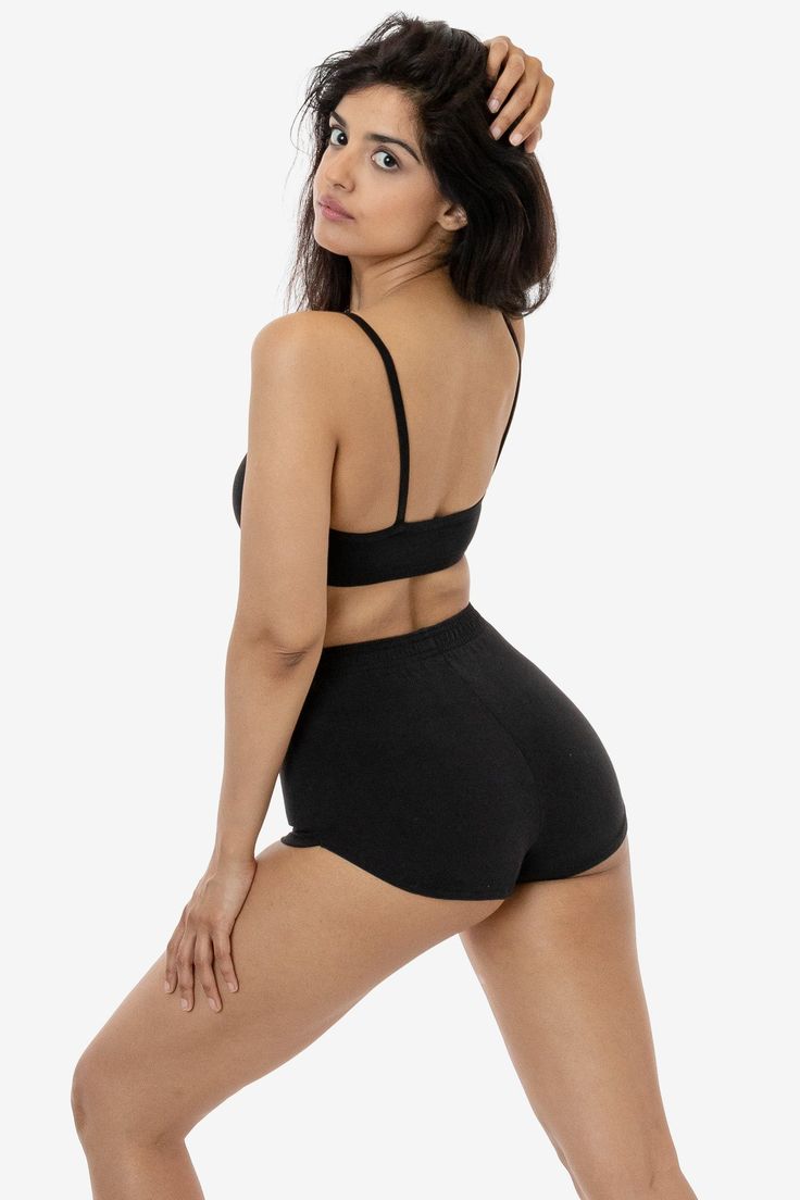 These cheeky hot shorts have a vintage, sporty-inspired look. Made of our heavyweight cotton spandex, these shorts feature a multi-needle elastic waist and curved dolphin hem and have been garment dyed for a rich, smooth finish. Pair with our matching 83016GD Spaghetti Bralette or any of our rib tanks for a timeless look. Perfect for at-home workouts or roller skating by the beach. Runs small, we recommend sizing up one size if you are in between sizes. Made in South Central, Los Angeles. Our ex Seashell Pink, Hot Short, South Central, Hot Shorts, By The Beach, Roller Skating, Kendall Jenner, Cotton Spandex, Dolphins