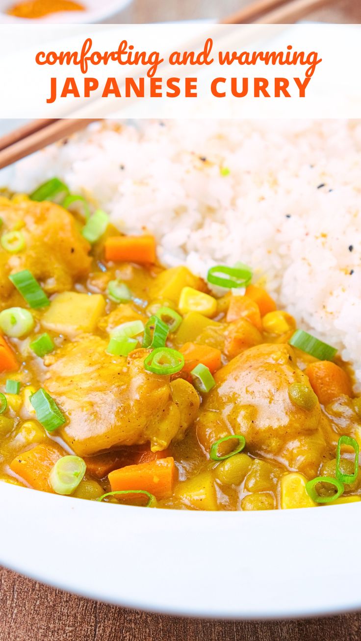 a white plate topped with rice and chicken next to chopsticks on a table