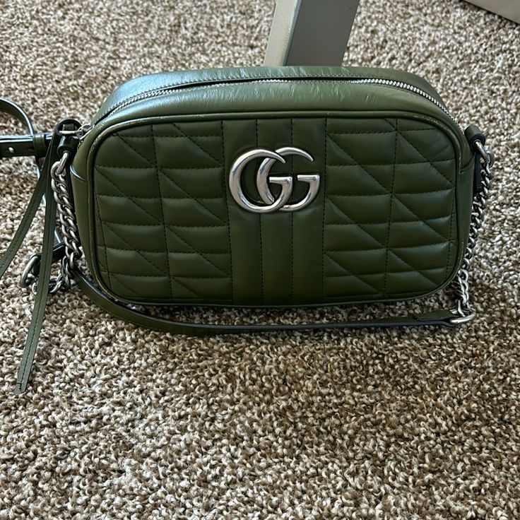 Olive Green Authentic Gucci Purse In Excellent Condition Some Wear On The Trim And Pen Mark On The Interior. Comes With Dust Bag. Gucci Green Bag With Detachable Strap, Green Gucci Bag With Detachable Strap, Gucci Green Shoulder Bag With Detachable Strap, Gucci Green Crossbody Bag, Gucci Green Satchel Bag, Green Gucci Crossbody Bag, Green Gucci Travel Bag, Designer Green Bags With Branded Hardware, Green Gucci Bag For Everyday Use