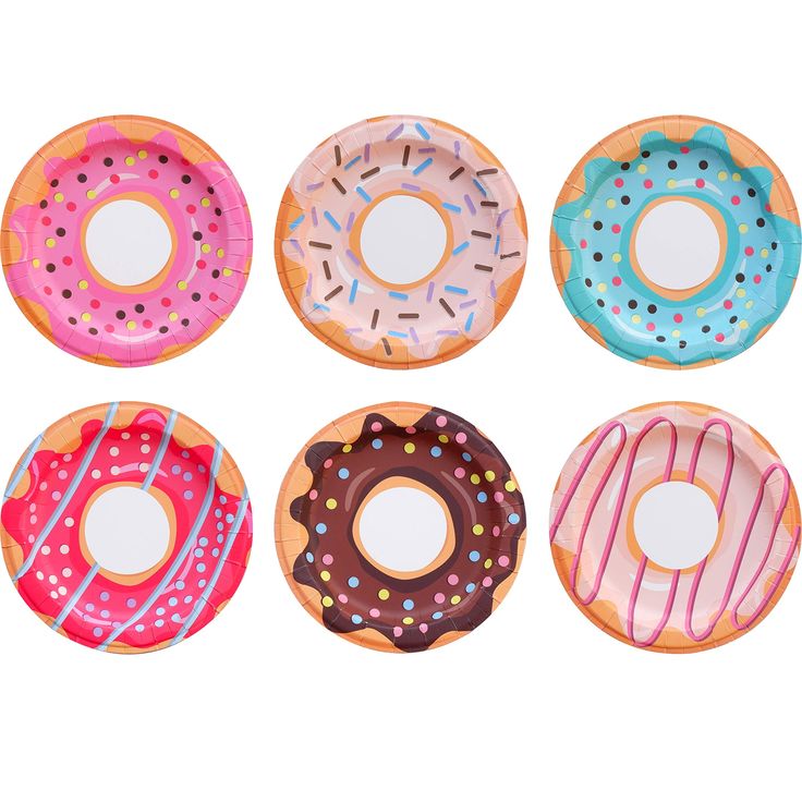 six donuts with different designs on them sitting in front of each other, all painted pink and blue