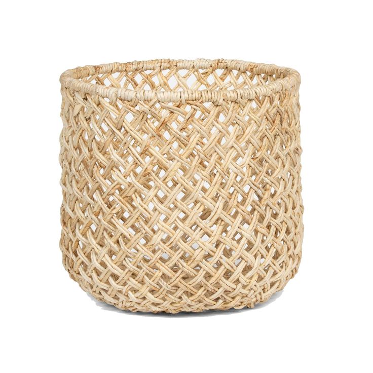 a woven basket on a white background