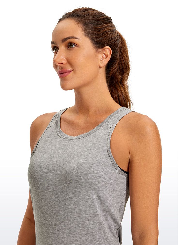 This yoga tank top hits exactly where you want it to. Open Back shows beautiful curves and feminine lines. Long hem and tie back design can freely adjust the tightness. Feature & Fitting: 
 Pima Cotton collection 
 Design for yoga 
 Slightly loose fit, round neck 
 Open back and tie back 
 Fabric: 
 Super soft and skin-friendly 
 Naturally breathable 
 Lightweight and stretchy 
 92% Pima cotton,8% Spandex 
 SKU : R774 .Easy reach by searching the SKU Casual Cross Back Tank Top With Built-in Bra, Gray Athleisure Tank Top With Built-in Bra, Casual Tank Top With Built-in Bra For Pilates, Racerback Tank Top With Built-in Bra For Yoga, Yoga Tank Top With Built-in Bra And Racerback, Sleeveless Tops With Built-in Bra For Light Exercise, Sleeveless Activewear With Built-in Bra For Pilates, Gray Workout Tank Top With Built-in Bra, Workout Gray Tank Top With Built-in Bra