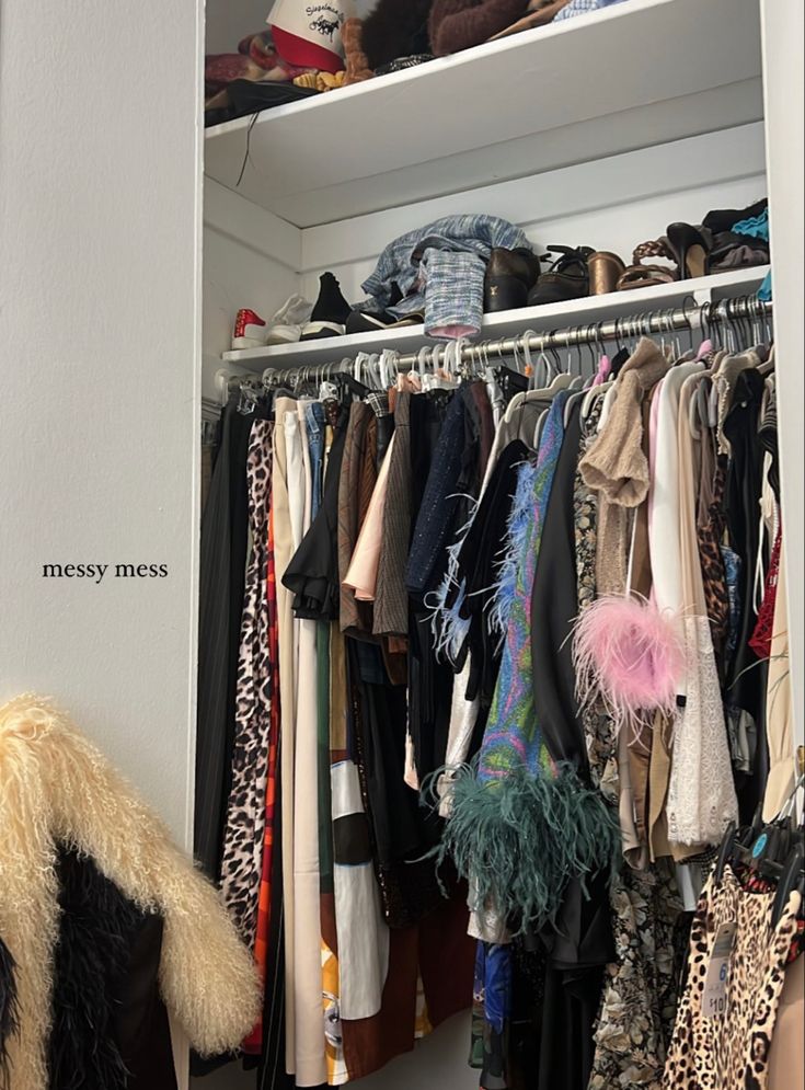 a closet filled with lots of clothes and shoes