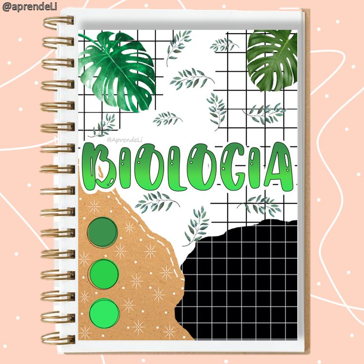 a spiral notebook with the words cocologia on it and some plants in front