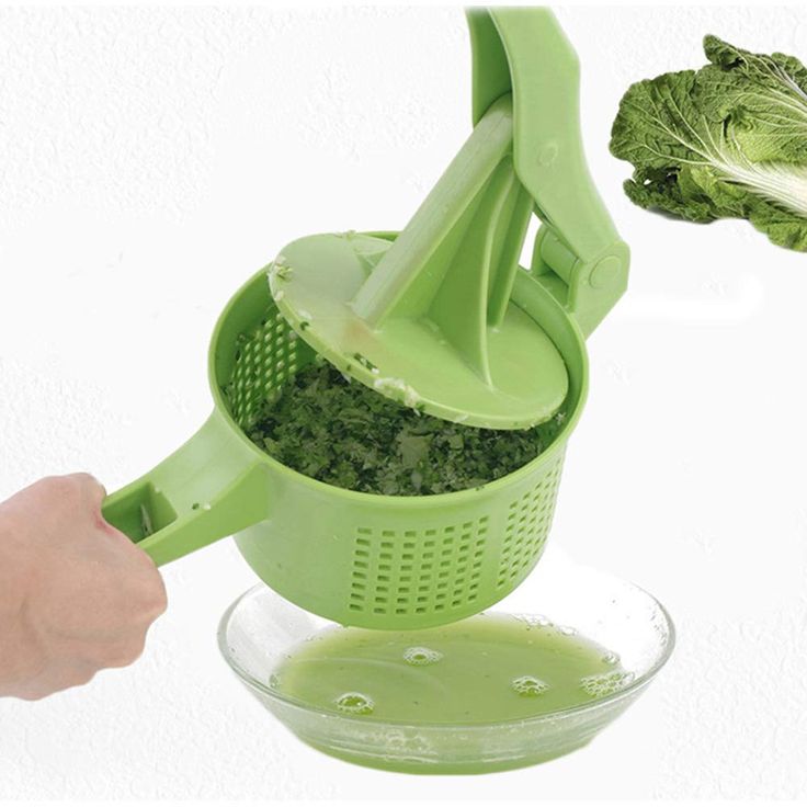 a person grating lettuce into a strainer