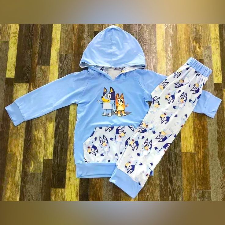 Bluey Jogger Outfit Brand New Ships Asap Sizes Available 3-6 Months, 6-12 Months, 12-18 Months, 2t, 3t, 4t, 5t, 6-7, 7-8. A Few Additional Sizes If Needed. Blue Family Matching Sets For Playtime, Blue Cotton Playdate Sets, Playful Blue Sets For Playwear, Cute Blue Playwear Sets, Blue Cotton Play Sets, Cute Blue School Sets, Playful Blue School Sets, Cute Blue Sets For Playdate, Playful Light Blue Cartoon Print Sets