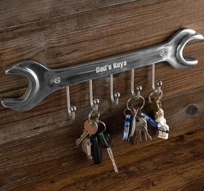 a wrench key holder with keys hanging from it